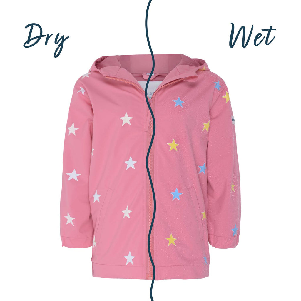 Kids colour changing pink star raincoat by Holly and Beau. Front view of the wet and dry colour changing.