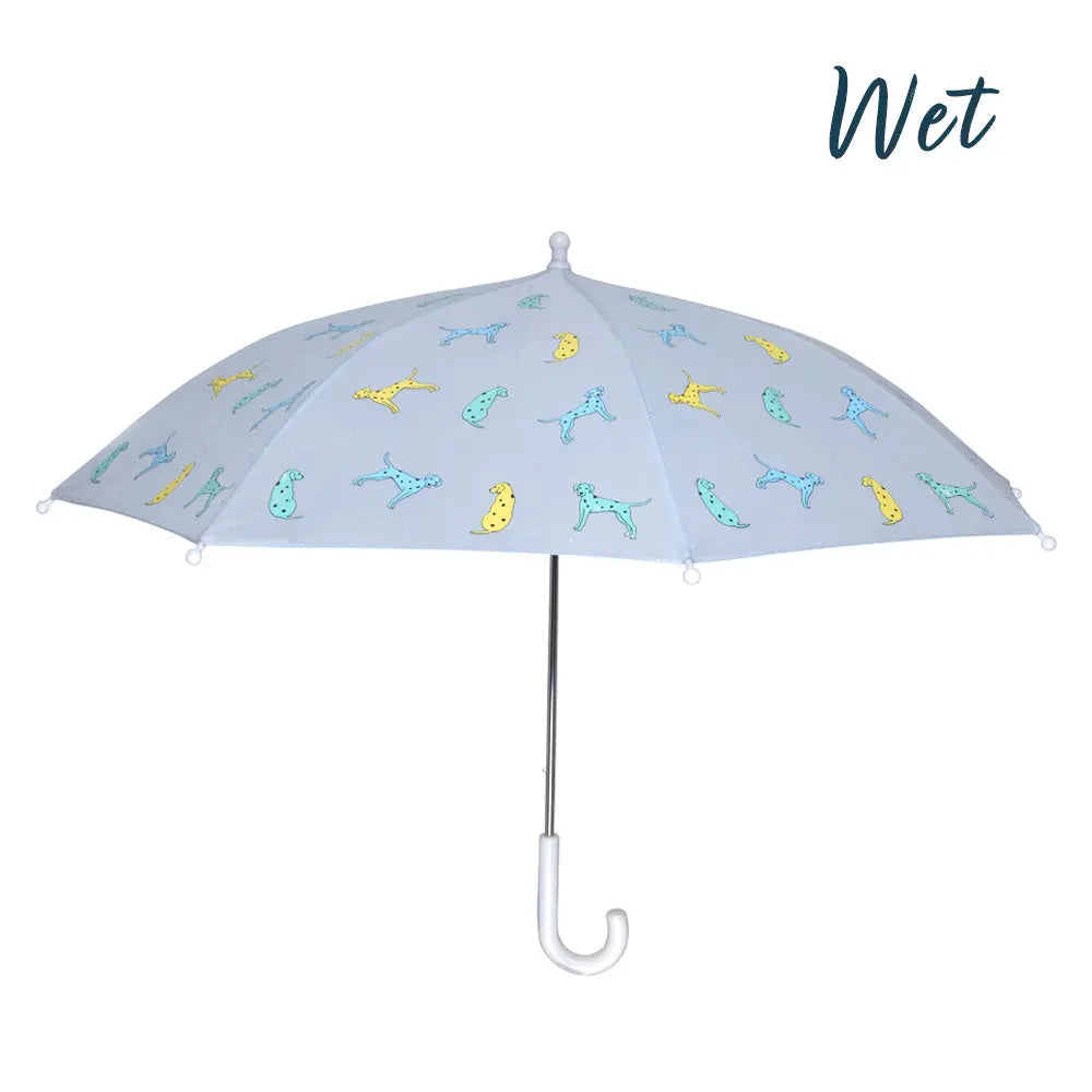 Kids light blue dalmatian colour changing umbrella by Holly and Beau. Side view of the kids colour changing umbrella with a wet view. Stick kids colour changing umbrella.