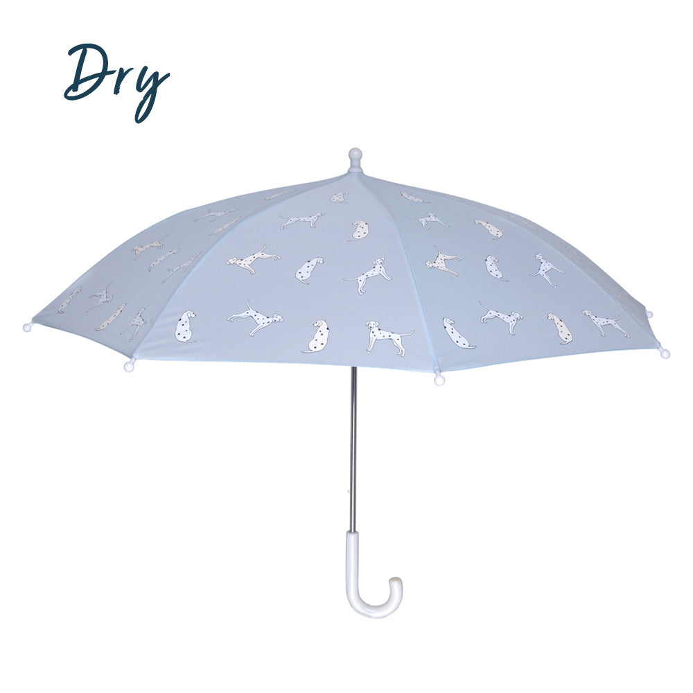 Kids light blue dalmatian colour changing umbrella by Holly and Beau. Side view of the kids colour changing umbrella with a dry view. Stick kids colour changing umbrella.