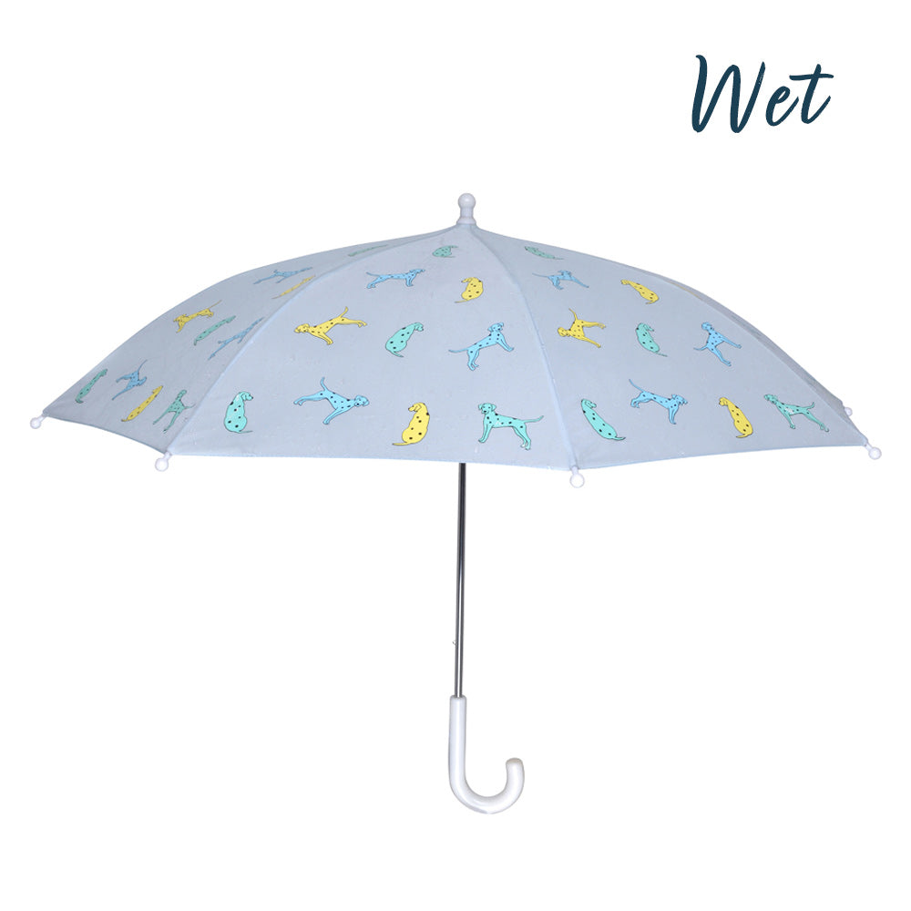 Kids light blue dalmatian colour changing umbrella by Holly and Beau. Side view of the kids colour changing umbrella with a wet view. Stick kids colour changing umbrella.