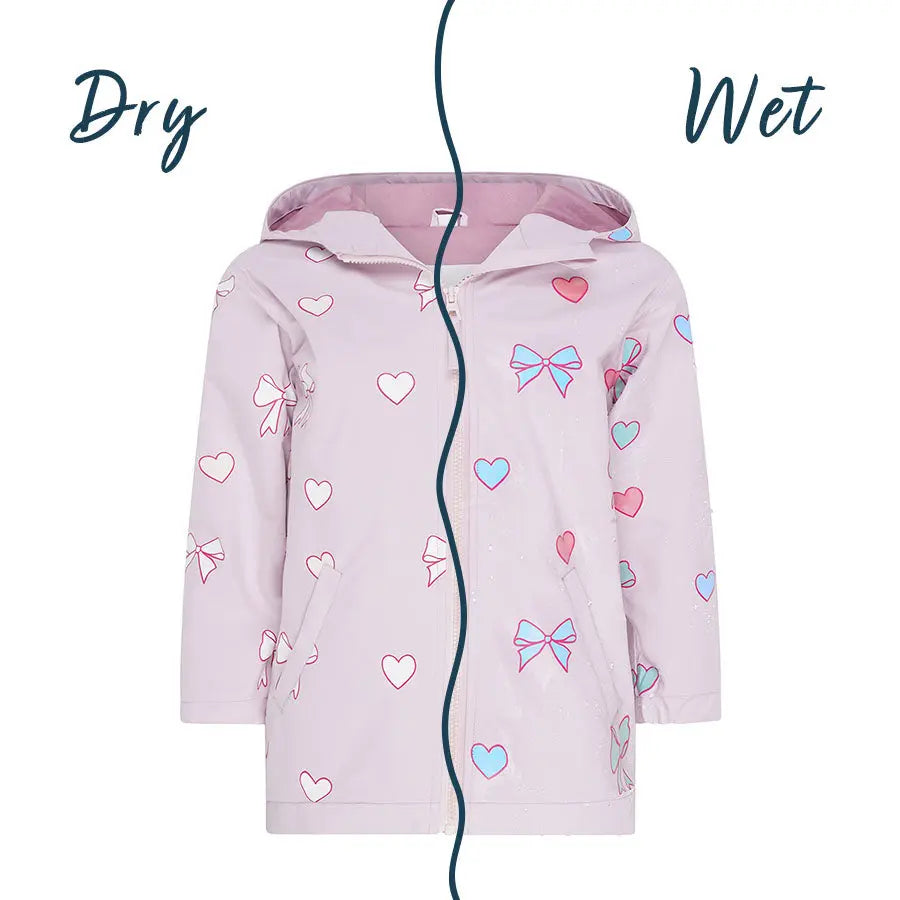 Wet and dry view of the pink bows and hearts colour changing raincoat by Holly and Beau