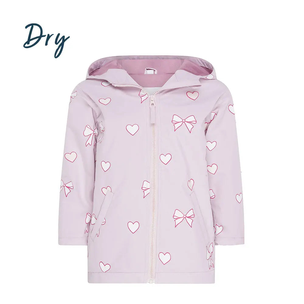 Front dry view of the pink bows and hearts colour changing raincoat by Holly and Beau