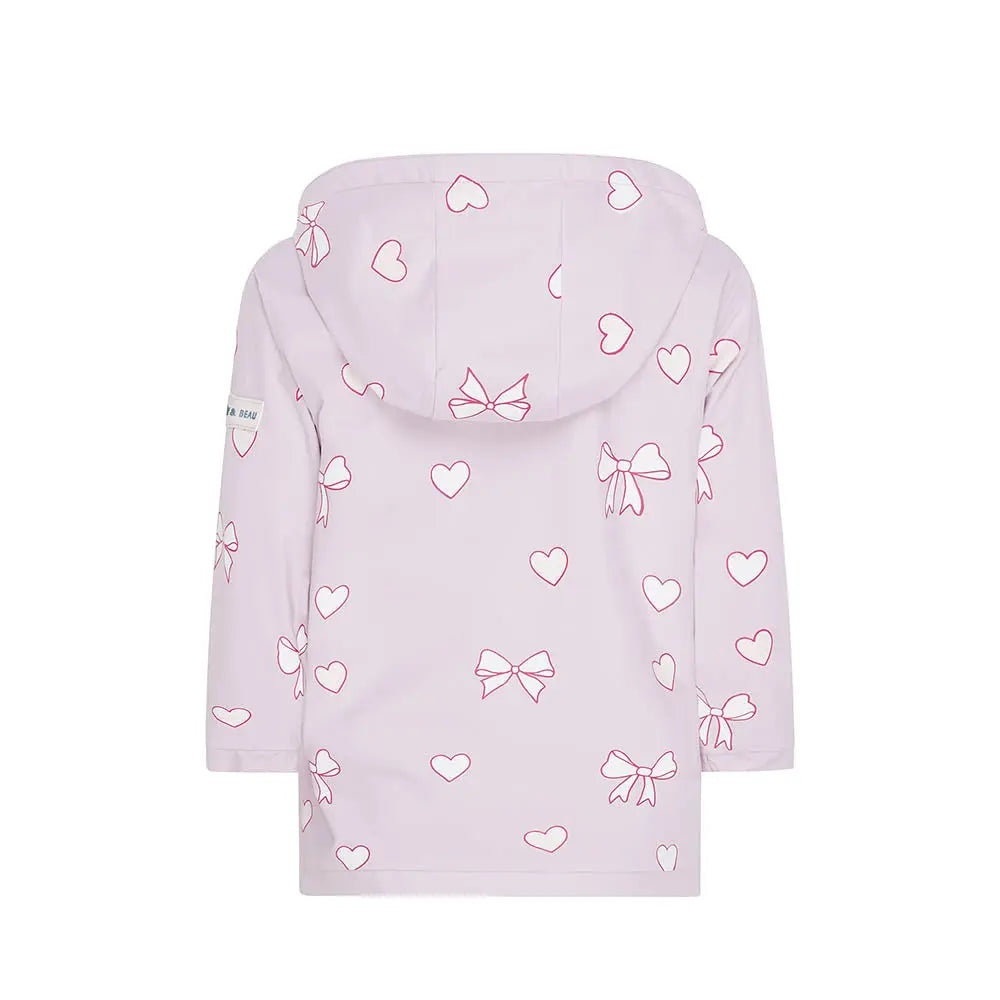 Holly and Beau Back view dry colour changing kids raincoat in the pink bows and hearts design