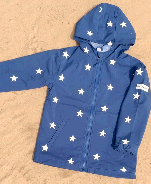 Colour changing kids raincoat in blue star design. Toddler boys raincoat. Fun boys gift, kids rainwear. gif
