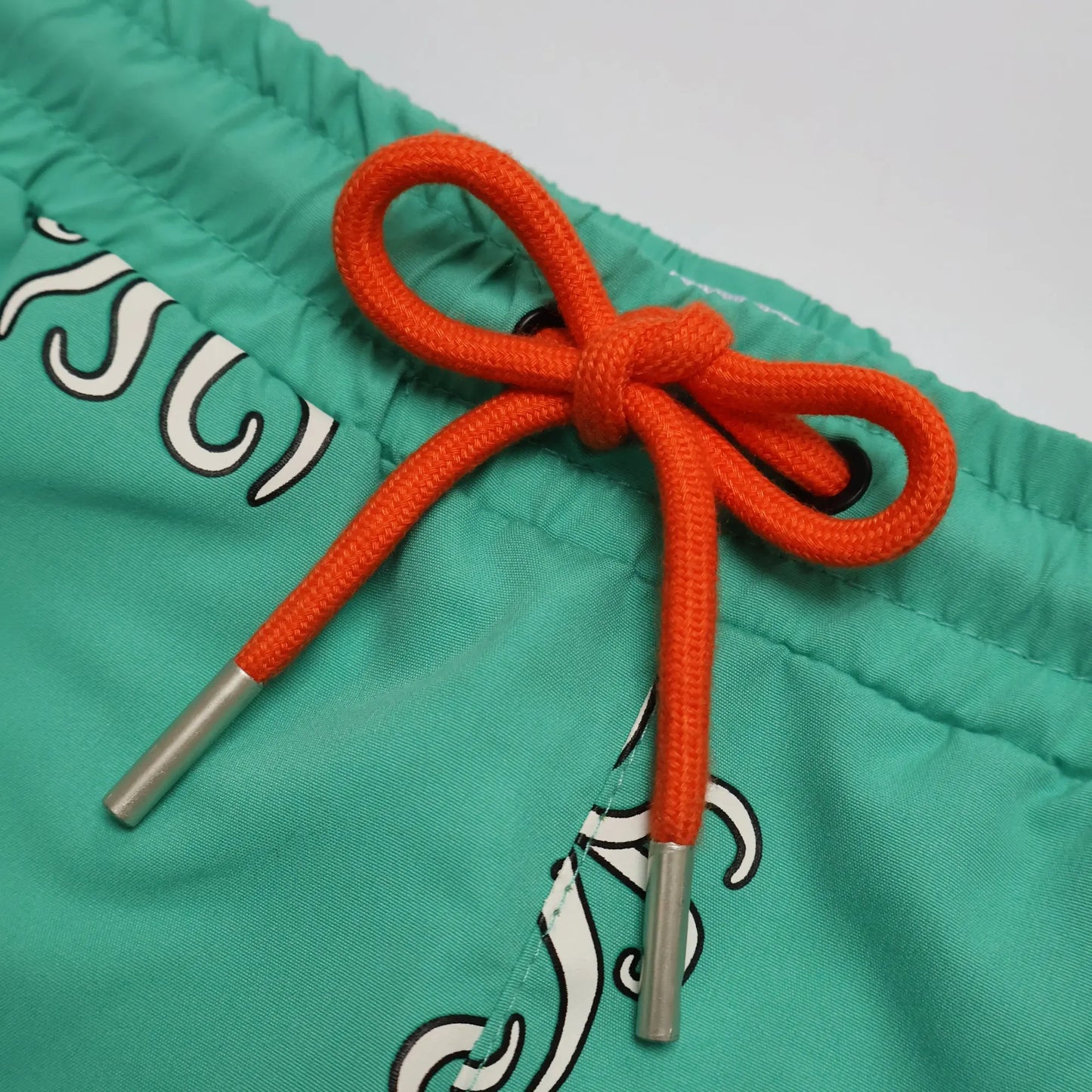 Holly and Beau Front detail drawstring colour changing octopus swim shorts