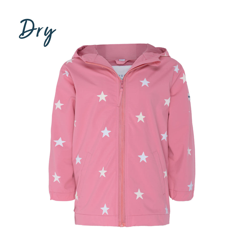 Girls colour changing pink star raincoat by Holly and Beau. Front view of the dry colour changing raincoat.