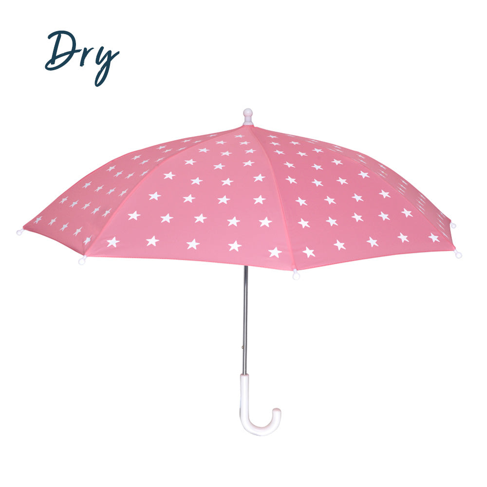 kids pink star colour changing umbrella by Holly and Beau. Side view of the kids umbrella dry. Stick kids colour changing umbrella.