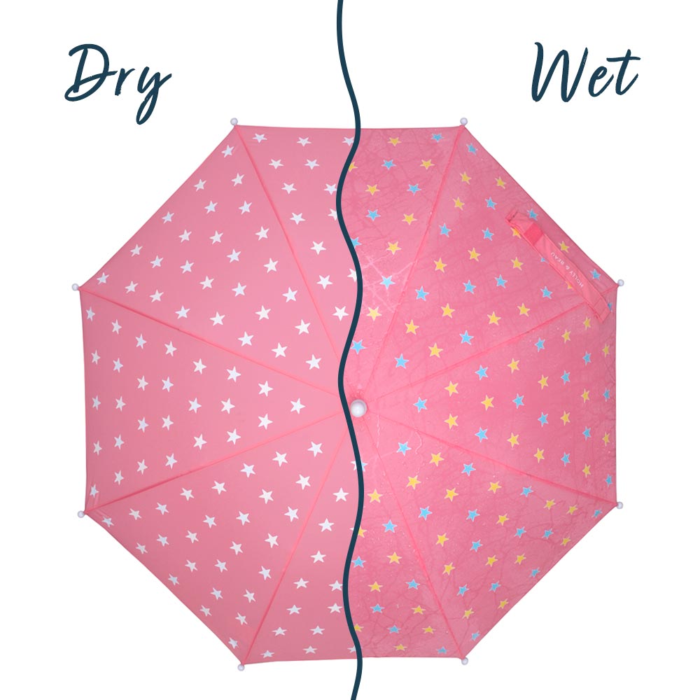 kids pink star colour changing umbrella by Holly and Beau. Above view of the umbrella with a wet/dry comparison. Stick kids colour changing umbrella.