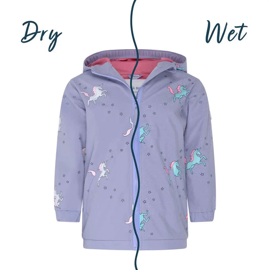 Girls unicorn colour changing raincoat by Holly and Beau. Front wet and dry view of the colour changing girls unicorn raincoat