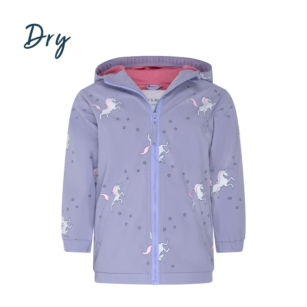 Girls unicorn colour changing raincoat by Holly and Beau. Front dry view of the colour changing girls raincoat.