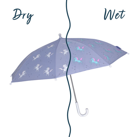 Kids purple unicorn colour changing umbrella by Holly and Beau. Side view of the kids colour changing umbrella with a wet/dry comparison. Stick kids colour changing umbrella.