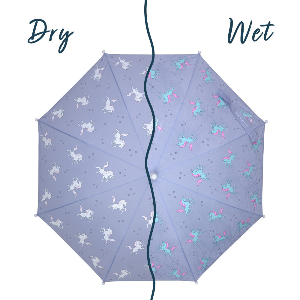 Kids purple unicorn colour changing umbrella by Holly and Beau. Above view of the kids colour changing umbrella with a wet/dry comparison. Stick kids colour changing umbrella.