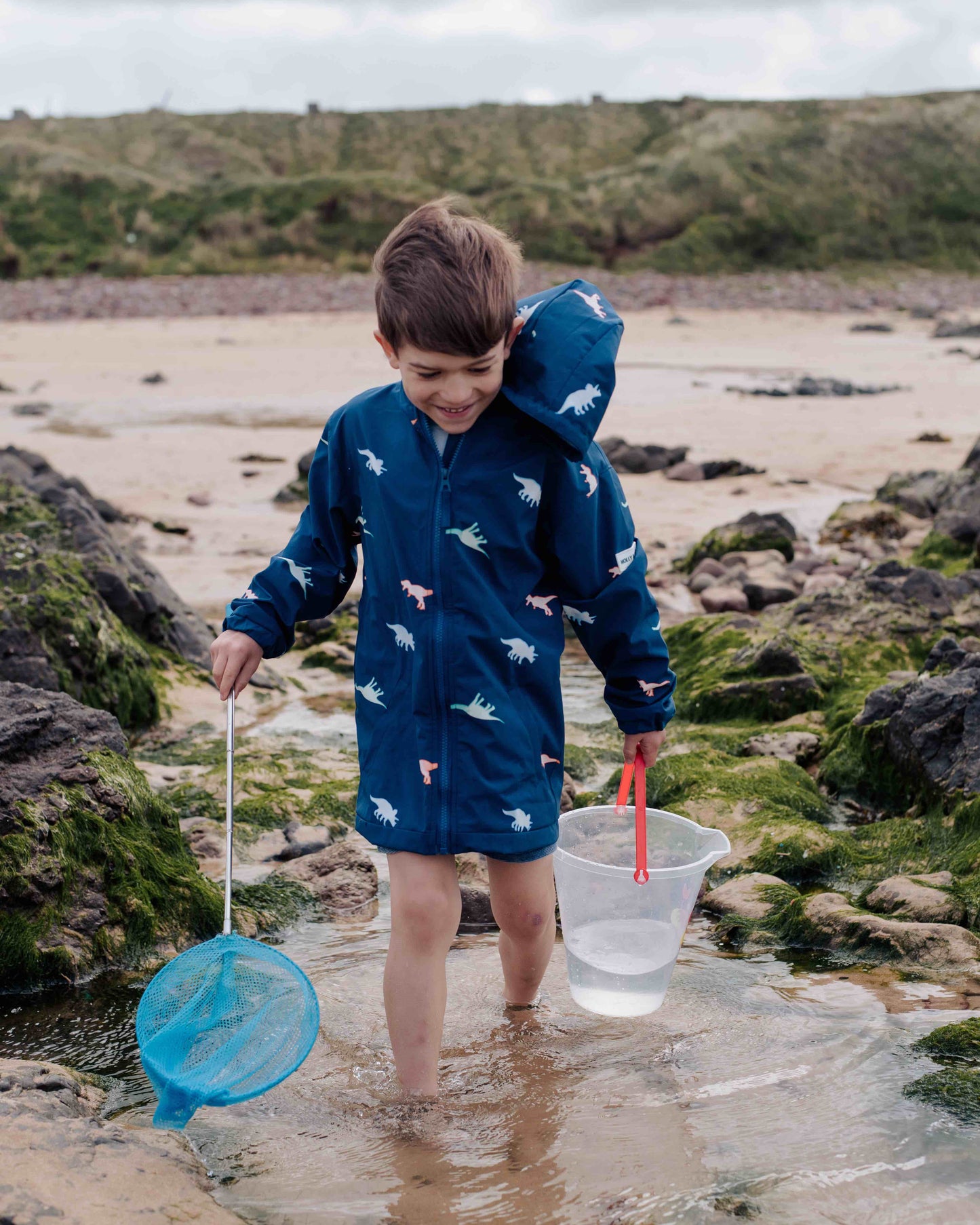 Holly and Beau beach colour changing dinosaur raincoat