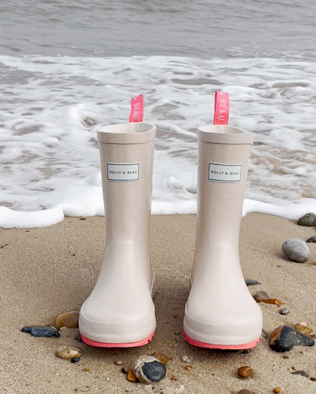 Camel & Coral girls rubber rain boots by rainwear brand Holly and Beau. Made from natural rubber, ideal for rainy days and muddy puddles. A great gift for a little boy and a little girl.