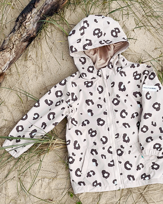 Holly and Beau Kids Leopard print raincoat, changes colour in the rain. The best gift for little girls and boys